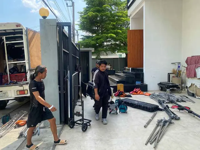 Gear cases being moved on location