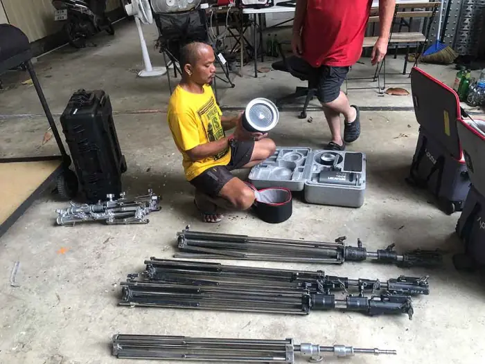 Crew setting up equipment on the ground